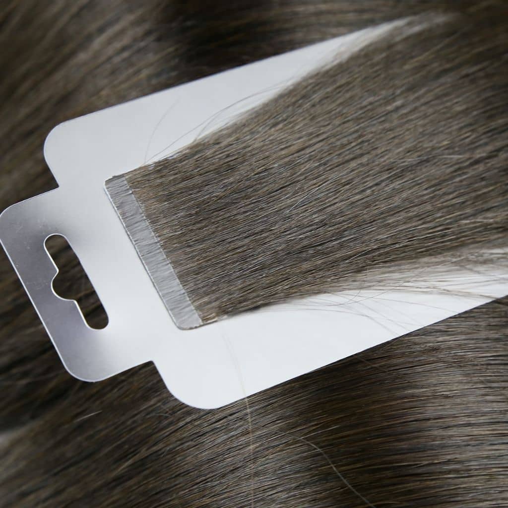 Invisible-Tape-in--hair-extensions-wholesale-at-new-times-hair