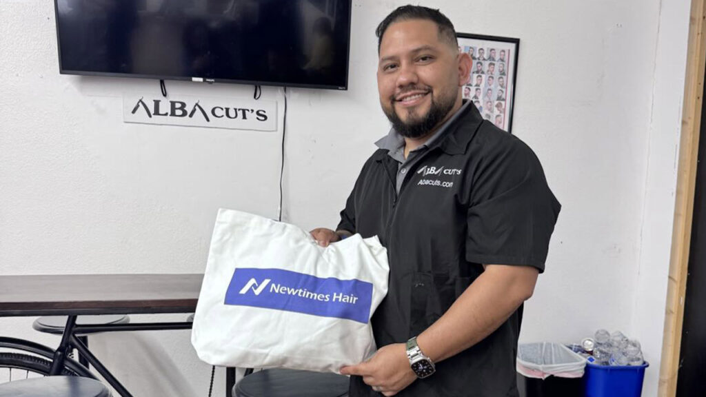male client holdng our products after receiving them.