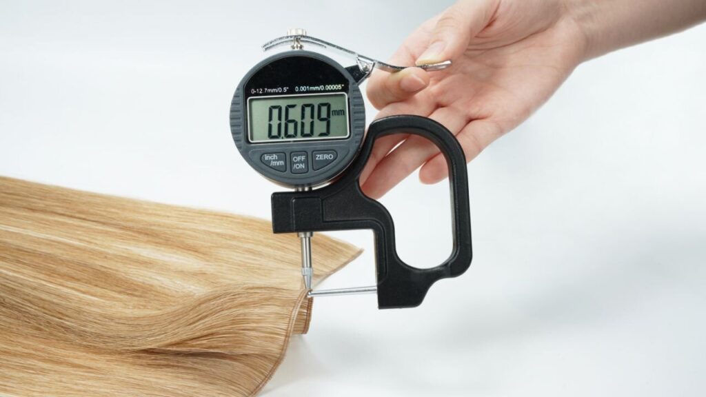 A Genius Weft Hair Extension Spine is only 0.6mm (0.02") thick, it can be called an invisible Genius Weft