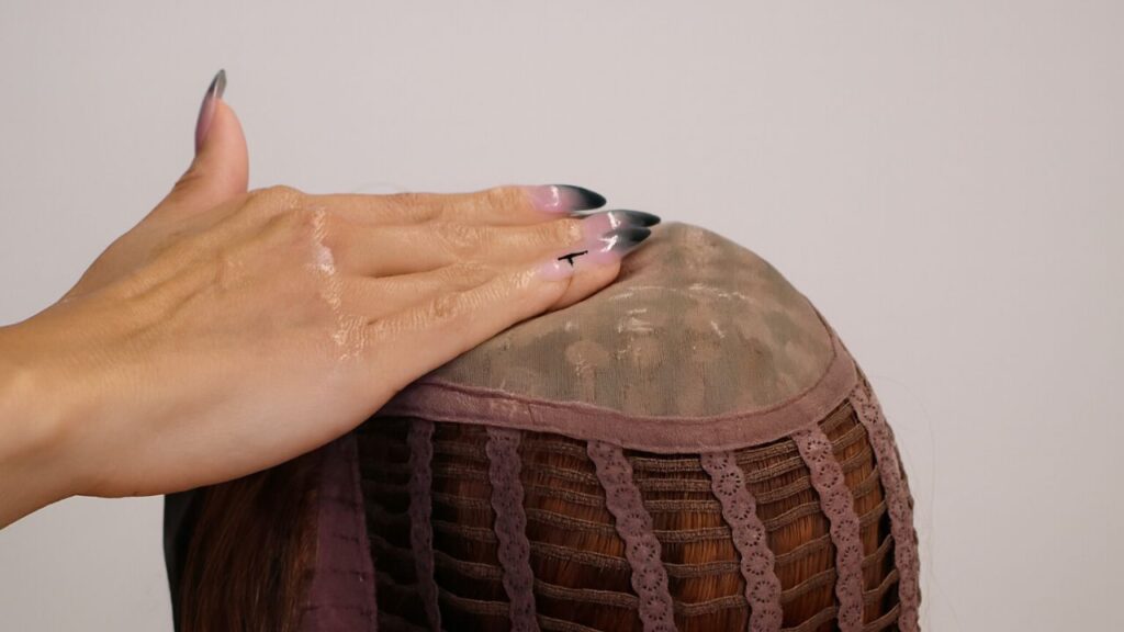 Washing the underside of a lace wig base