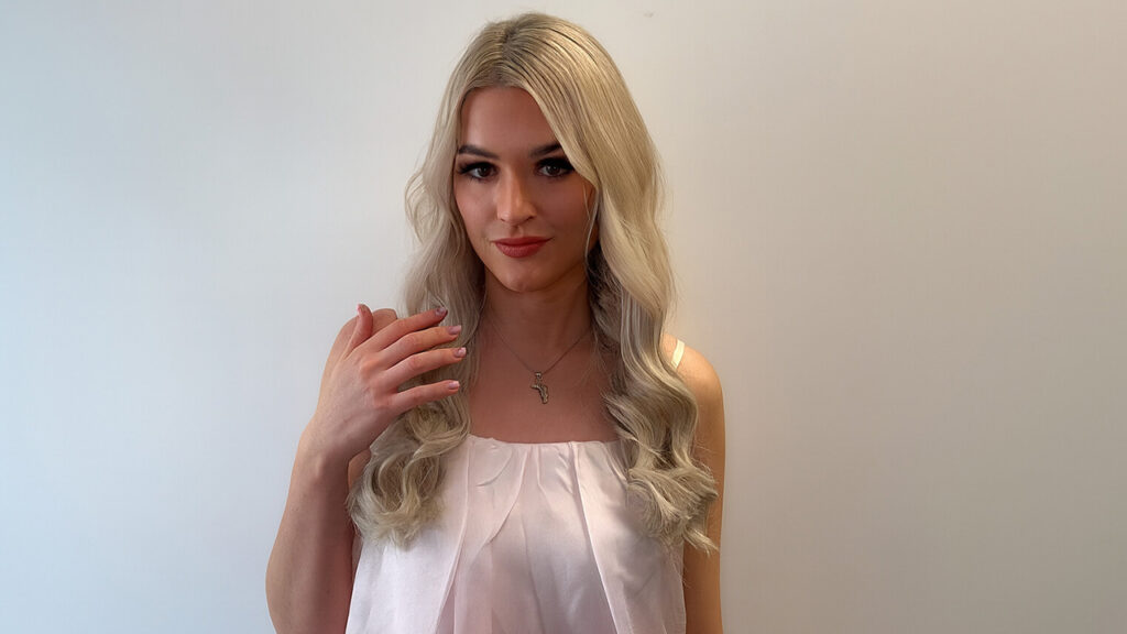 After installation, Sasha is showing off her Genius Wefts which have just been installed